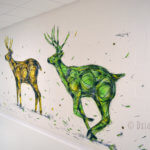 Fresque de trois cerfs qui court